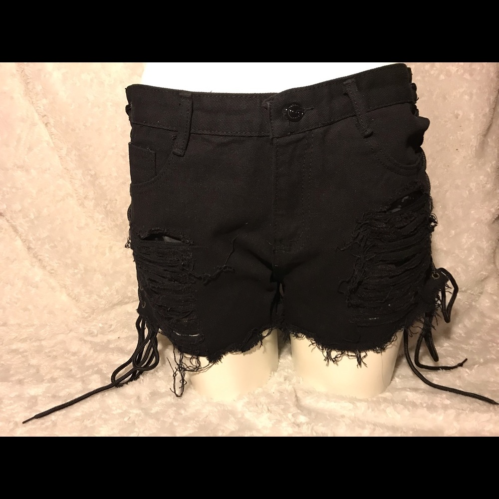 Black ripped shorts with tie-up on the side